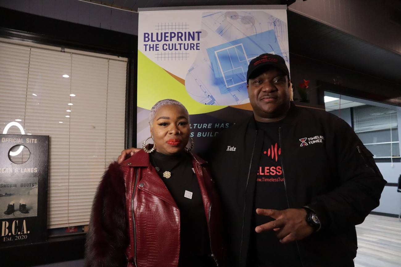 Talia Johnson Huff with DJ Kutz of Timeless Tunez at Illuminate 2026