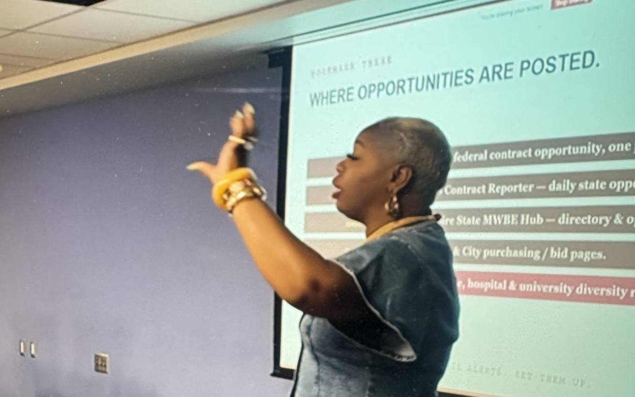 Talia Johnson Huff teaching a procurement training on where contract opportunities are posted