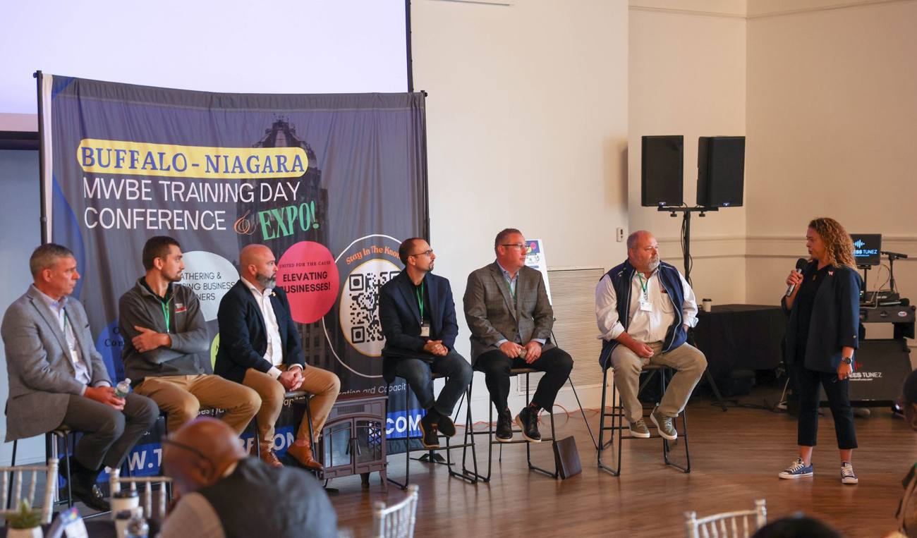 Construction panel on stage at the Training Day Conference